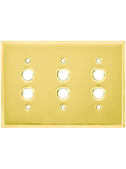 Classic Triple Gang Push Button Switch Plate In Polished Brass Finish.